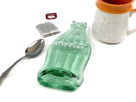 Coke container with spoon. Things To Know About Coke container with spoon. 